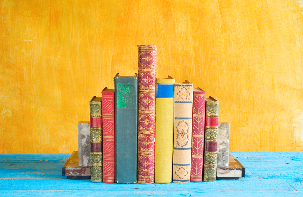 row of books, grungy background