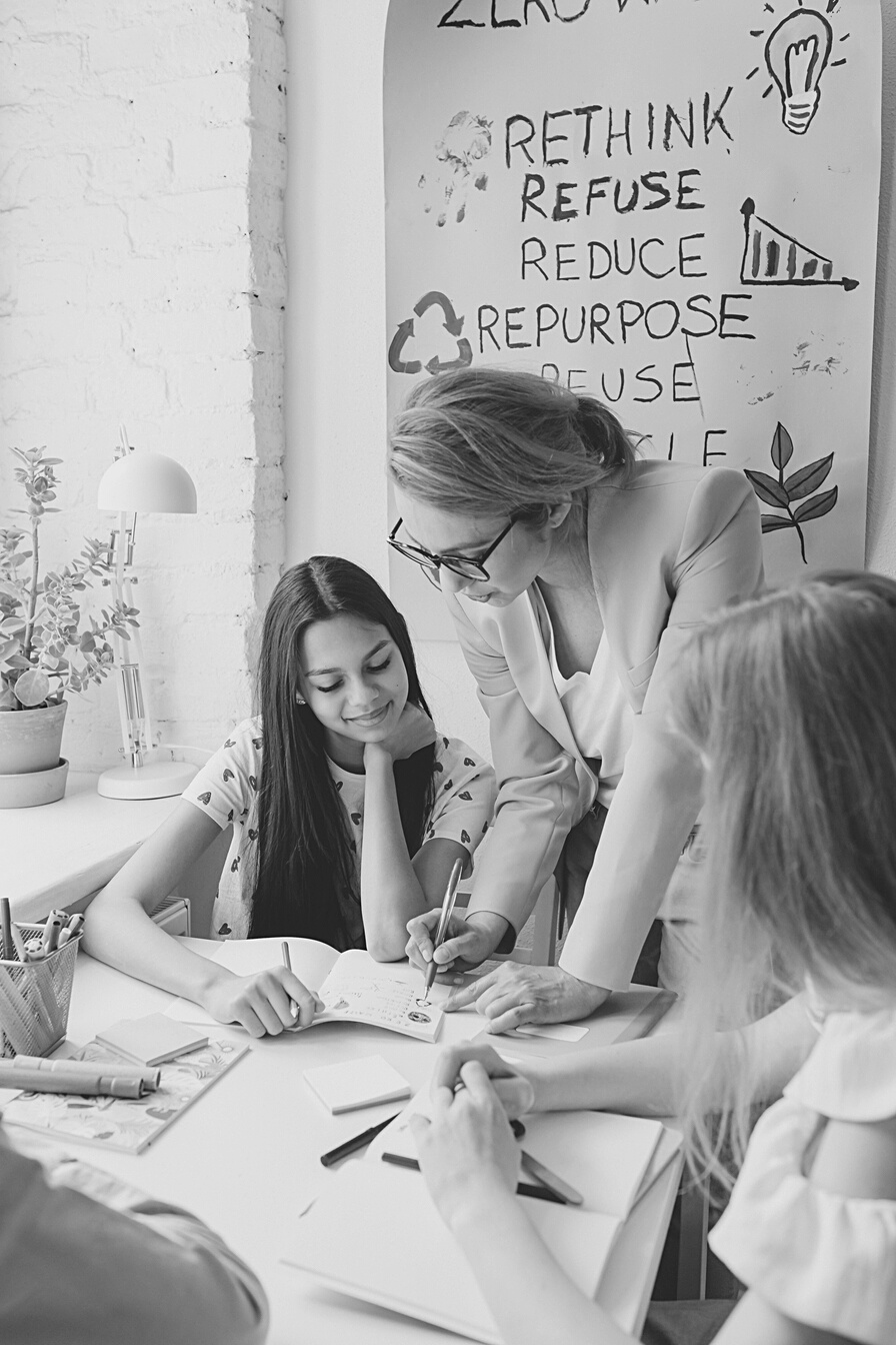 A Woman Teaching Her Students